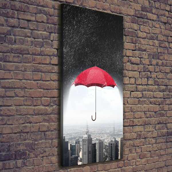 Foto auf leinwand vertikales Regenschirm über der Stadt
