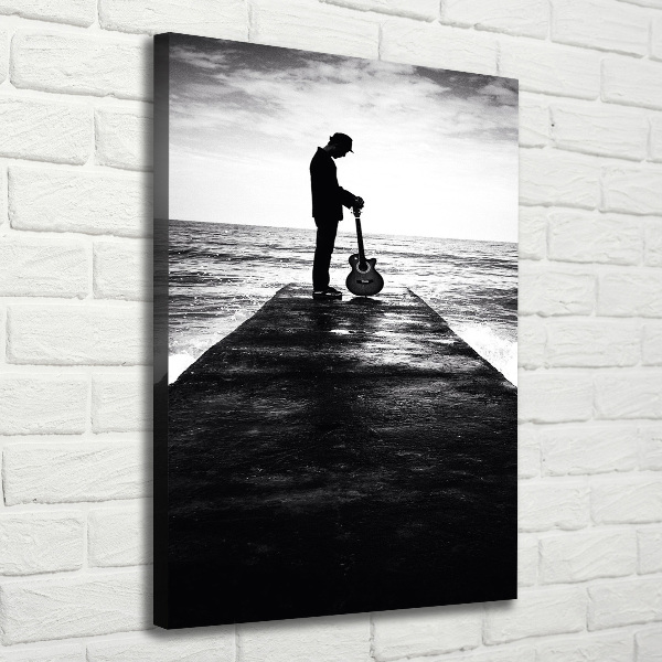Foto leinwand vertikales Gitarrist auf dem Pier