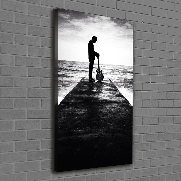 Foto leinwand vertikales Gitarrist auf dem Pier