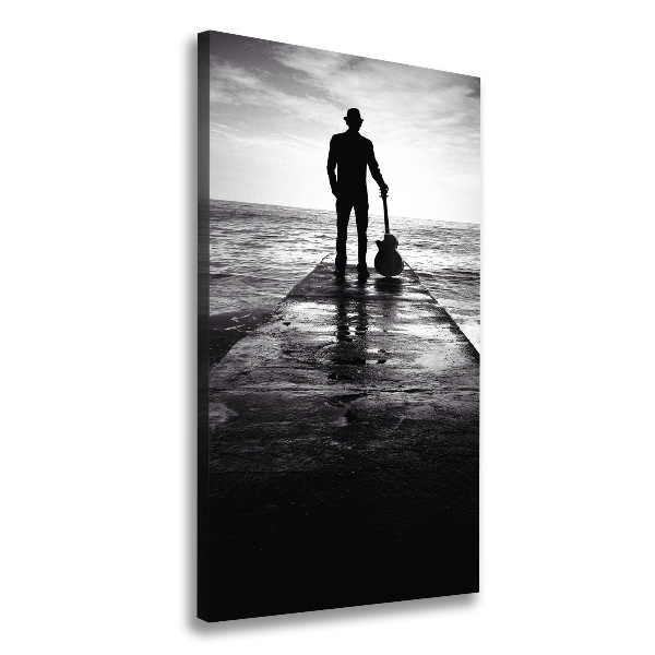 Foto auf leinwand vertikales Gitarrist auf dem Pier