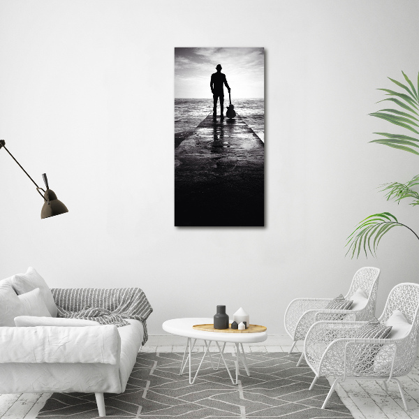 Foto auf leinwand vertikales Gitarrist auf dem Pier