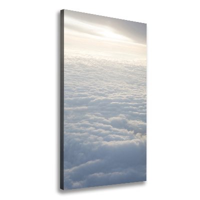 Foto leinwand vertikales Flug über den Wolken