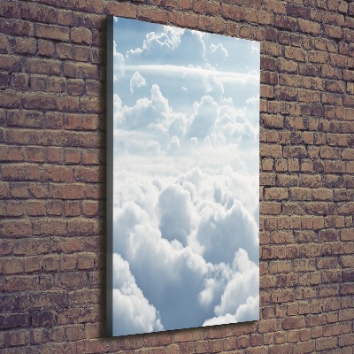 Foto leinwand vertikales Flug über den Wolken