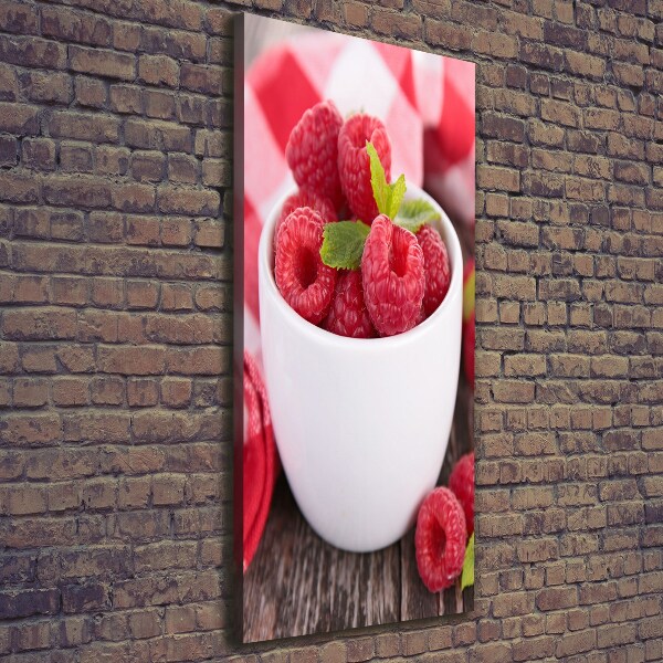 Wandbild vertikales Himbeeren in einer Tasse
