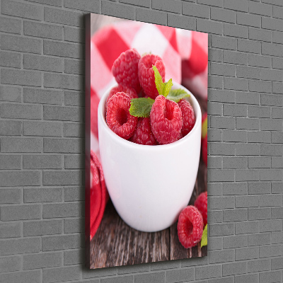 Wandbild vertikales Himbeeren in einer Tasse