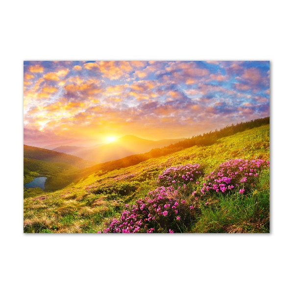 Foto glasbild Sonnenuntergang in den Bergen