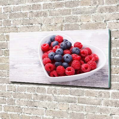 Glasbild Himbeeren und Blaubeeren