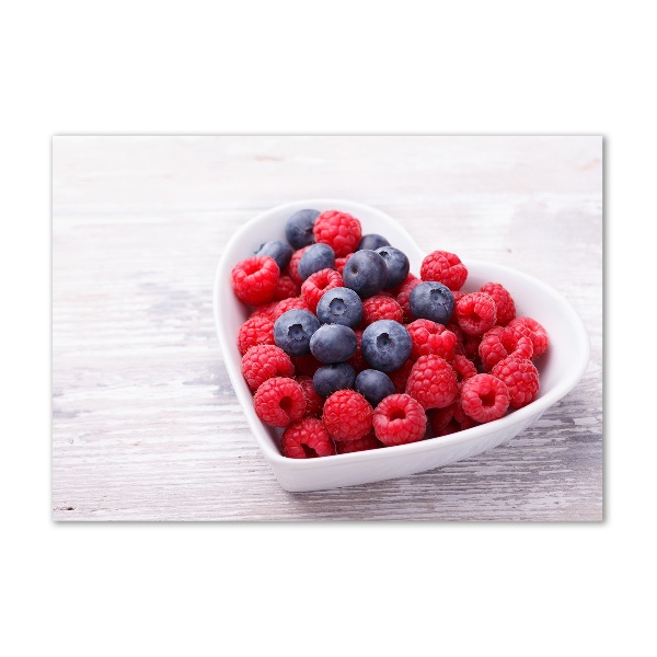 Glasbild Himbeeren und Blaubeeren