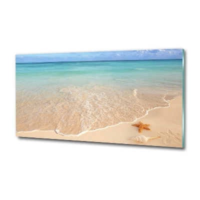 Foto glasbild Seesterne am Strand