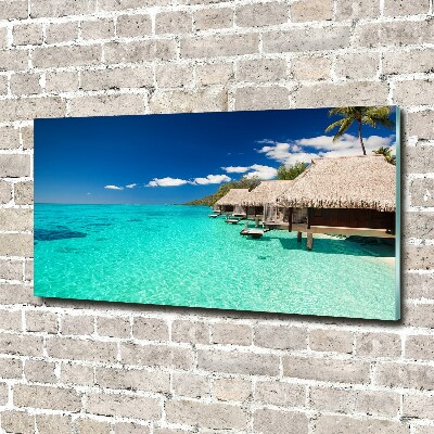 Glasbild Bungalows über dem Wasser