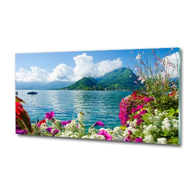 Bild auf glas Blumen am See