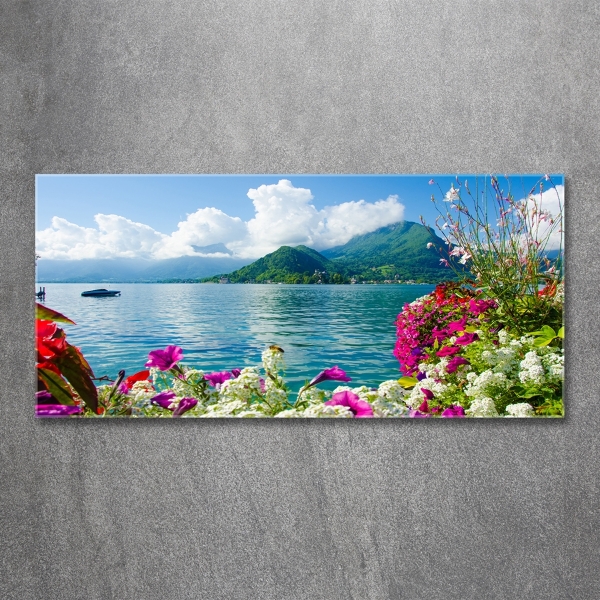 Bild auf glas Blumen am See