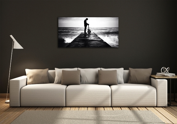 Glasbild Gitarrist auf dem Pier