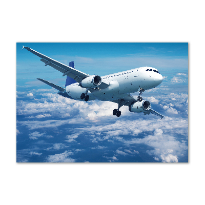 Bild auf glas Ein Flugzeug in den Wolken