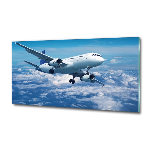 Bild auf glas Ein Flugzeug in den Wolken