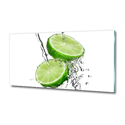 Glasbild Limetten und Wasser