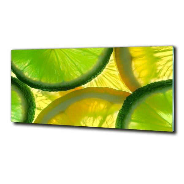 Glasbild Limette und Zitrone
