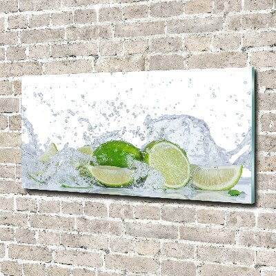 Glasbild Limetten und Wasser