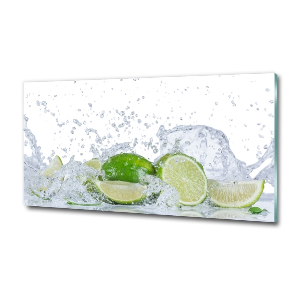 Glasbild Limetten und Wasser