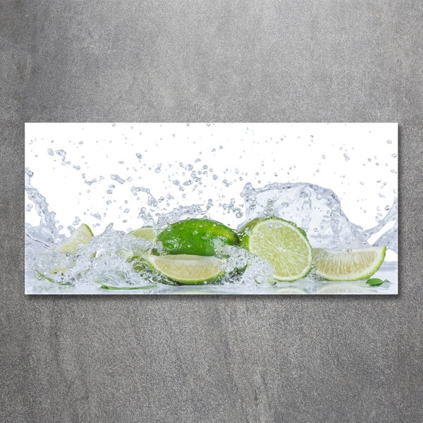 Glasbild Limetten und Wasser