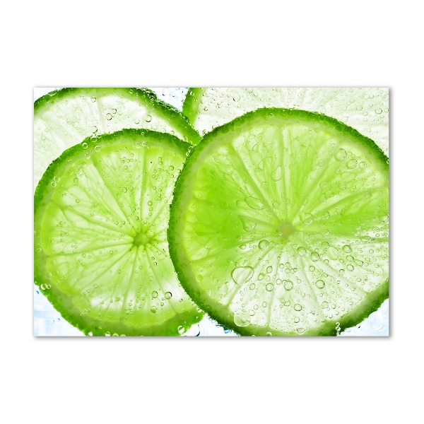 Glasbild Limetten unter Wasser