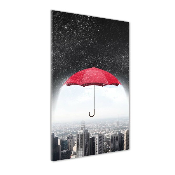 Glasbild vertikales Regenschirm über der Stadt