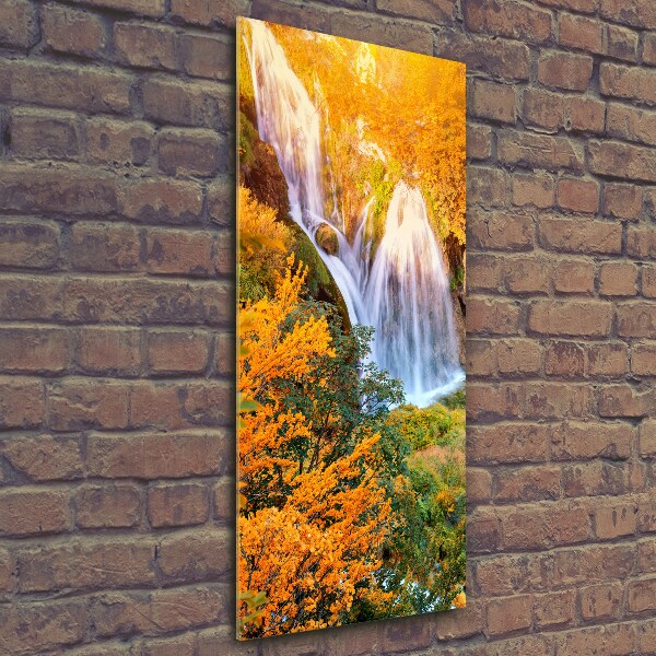 Glasbild vertikales Wasserfall im Herbst