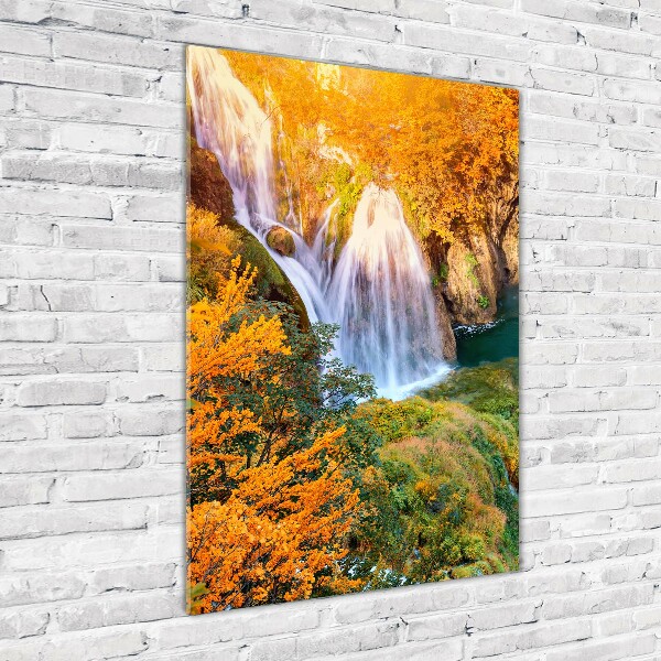Glasbild vertikales Wasserfall im Herbst