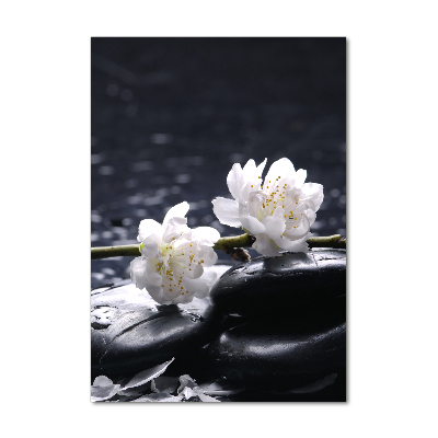 Glasbild vertikales Blumen und Steine