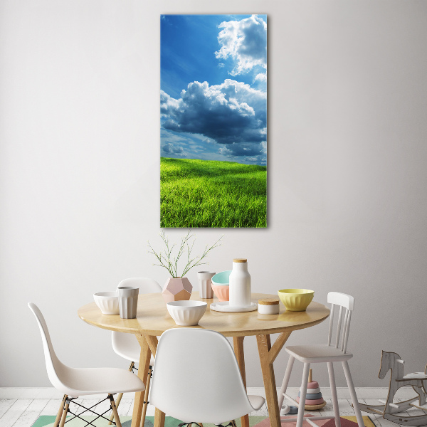 Glasbild vertikales Wolken über dem Feld