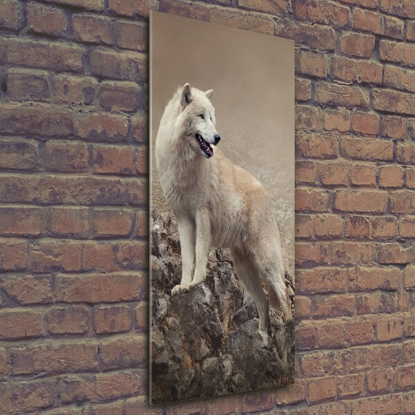 Glasbild vertikales Wolf auf einem Felsen