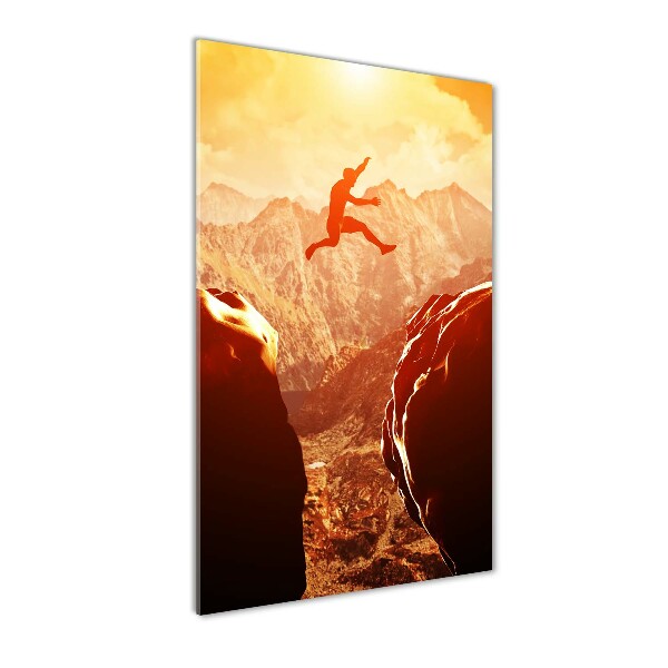 Foto auf glas vertikales Spring über den Abgrund