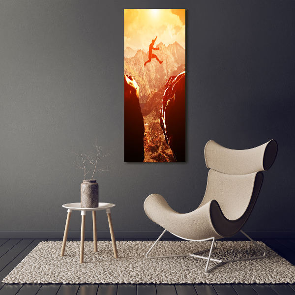 Foto auf glas vertikales Spring über den Abgrund