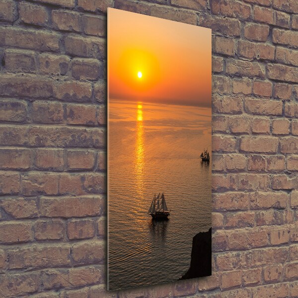Glasbild vertikales Sonnenuntergang am Meer