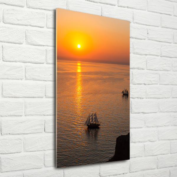 Glasbild vertikales Sonnenuntergang am Meer