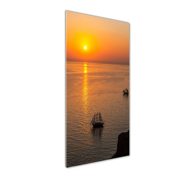 Glasbild vertikales Sonnenuntergang am Meer
