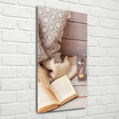Glasbild vertikales Entspannung mit einem Buch