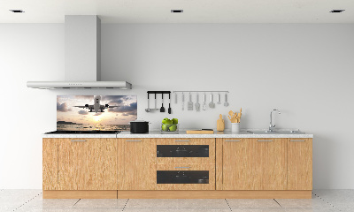 Platte für Küchenrückwand Ein Flugzeug über dem Meer