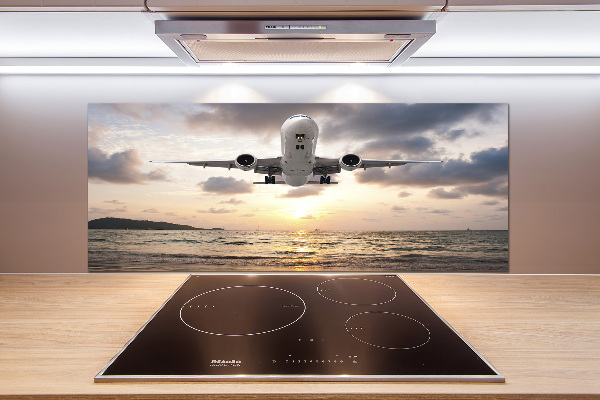 Platte für Küchenrückwand Ein Flugzeug über dem Meer