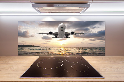Platte für Küchenrückwand Ein Flugzeug über dem Meer