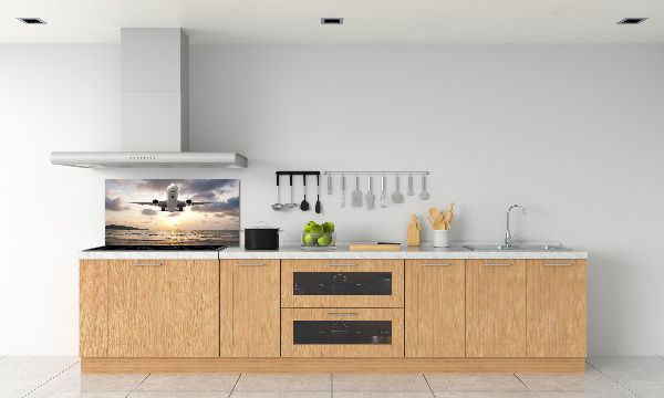 Platte für Küchenrückwand Ein Flugzeug über dem Meer