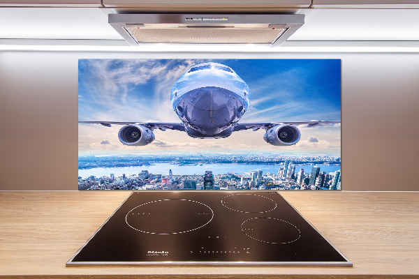 Küchen wandpaneel Ein Flugzeug über der Stadt
