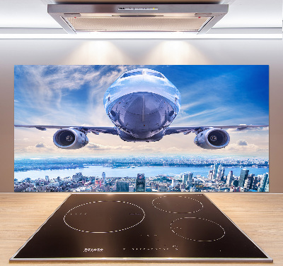 Küchen wandpaneel Ein Flugzeug über der Stadt