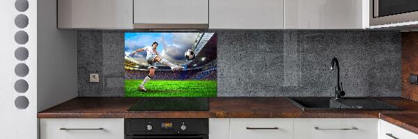 Küchen wandpaneel Ein Fußballspieler im Stadion