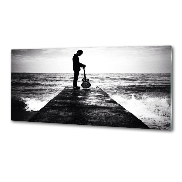 Glasrückwand für die küche Gitarrist auf dem Pier