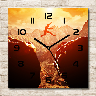 Wanduhr modern quadratisch Spring über den Abgrund