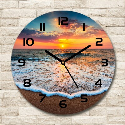 Wanduhr rund Sonnenuntergang über dem Meer