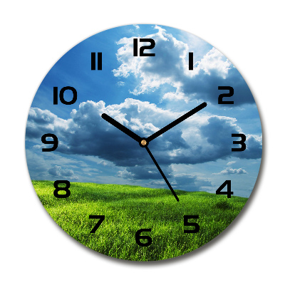 Wanduhr glas rund Wolken über dem Feld
