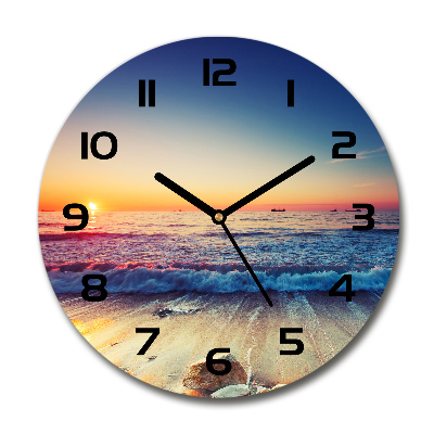 Wanduhr rund Sonnenaufgang am Meer
