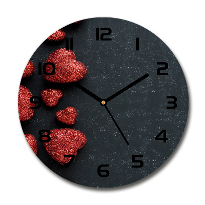 Wanduhr rund Herzen auf dem Brett